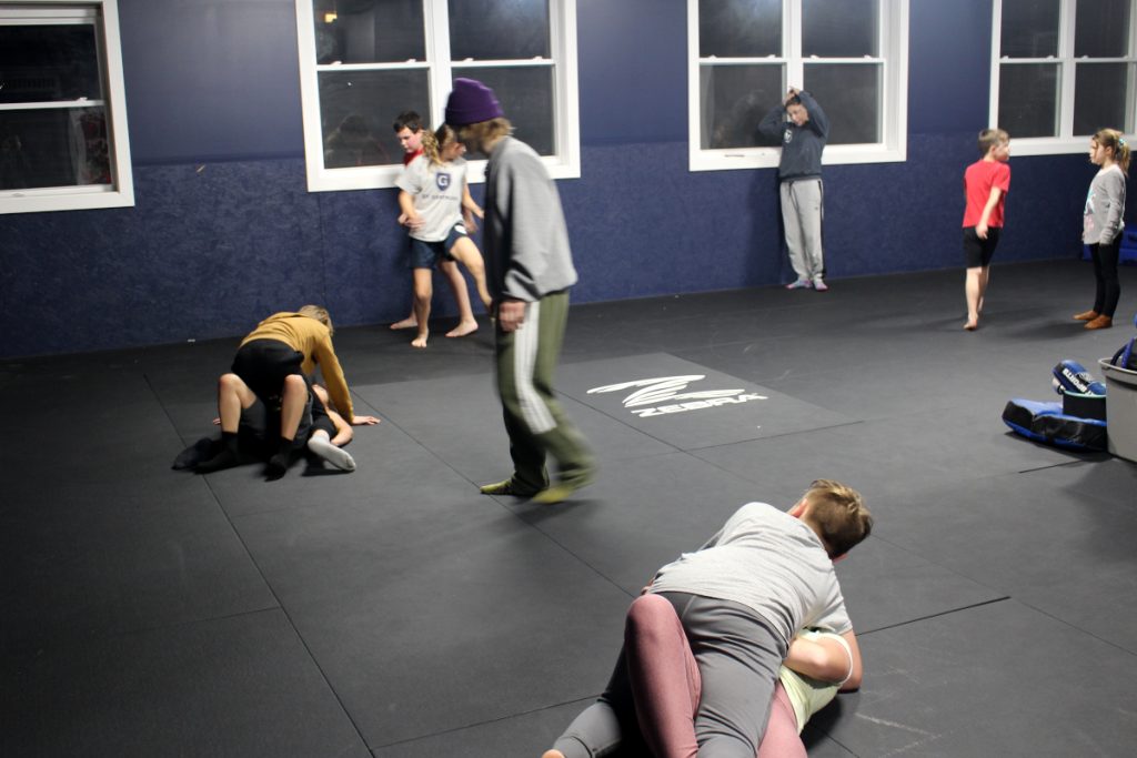 Youth Jiu Jitsu Kids Eddie Helping Sparring