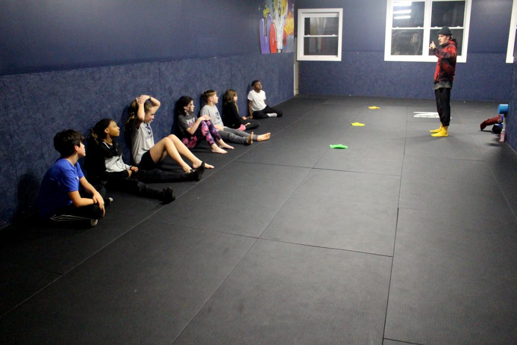 Youth Striking Coach Charles Giving Instructions